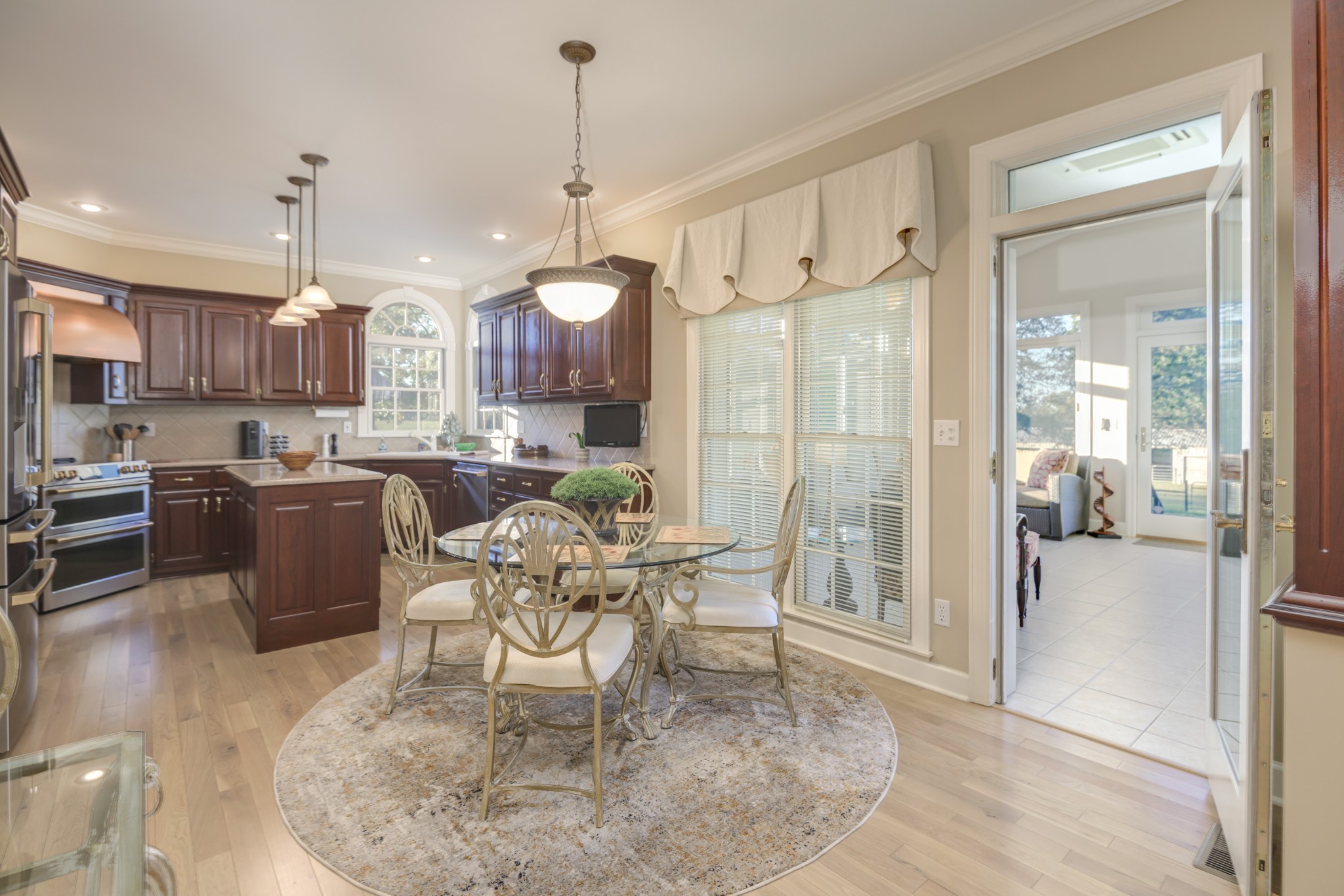 162 W Road Wartrace, TN 37183 - Photo 34 of 96 a view of a dining room and livingroom with furniture wooden floor a chandelier