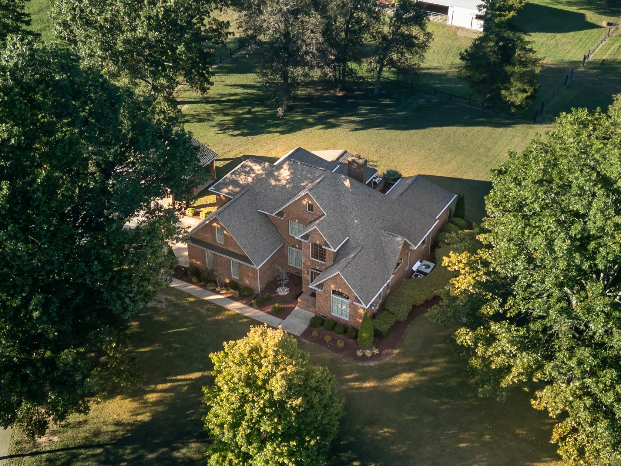 162 W Road Wartrace, TN 37183 - Photo 80 of 96 an aerial view of a house with yard lake and trees all around