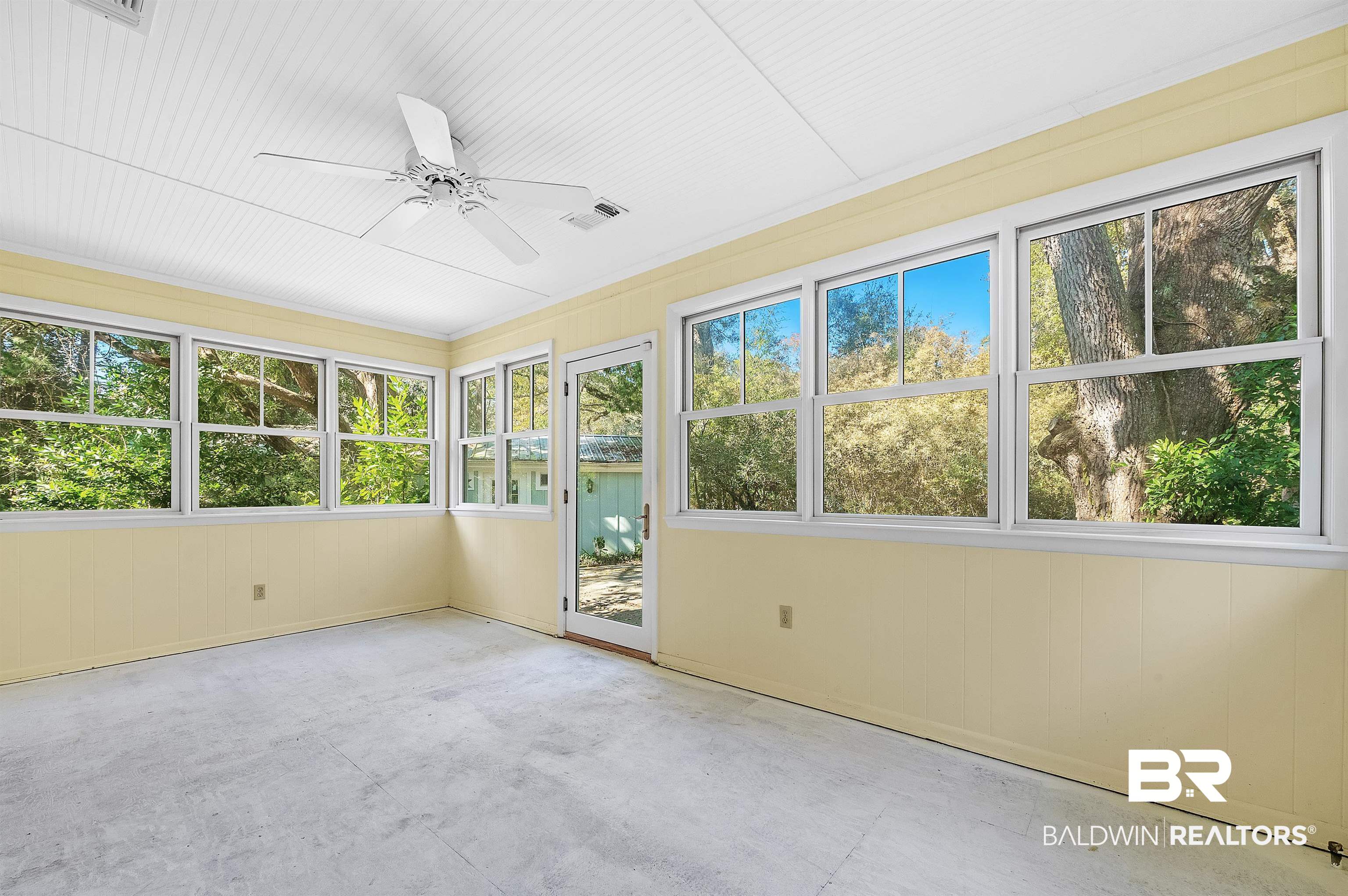 14375 Oak Street Magnolia Springs, AL 36555 - Photo 14 of 20 Unfurnished sunroom with ceiling fan