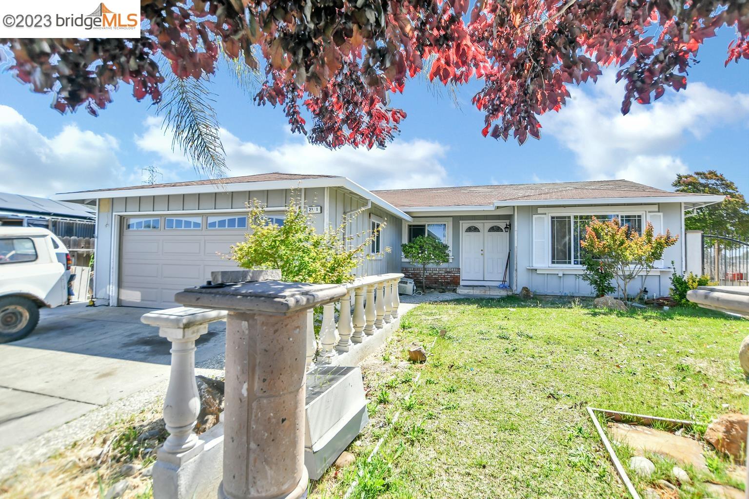a view of house with outdoor seating