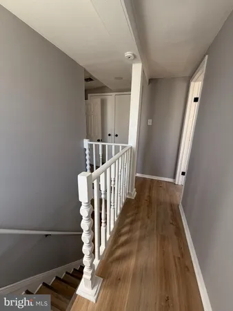 a view of entryway with wooden floor