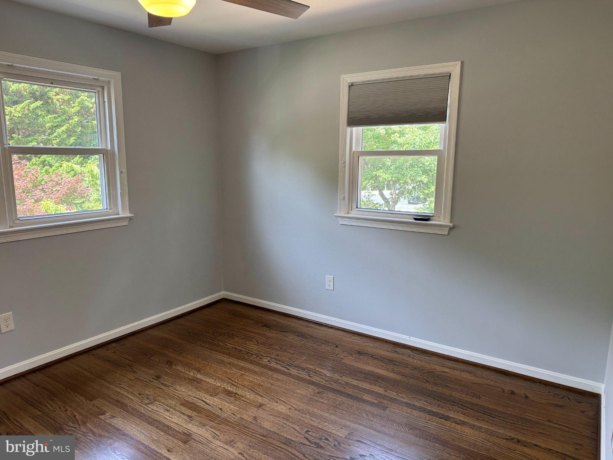 6603 Huntsman Boulevard Springfield, VA 22152 - Photo 22 of 64 Bright and airy room with hardwood floors.