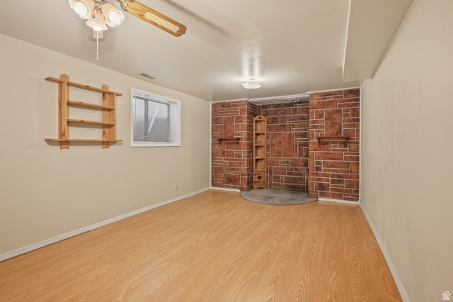 337 North Main Street Central Valley, UT 84754 - Photo 28 of 40 Finished below grade area featuring light wood-style flooring and ceiling fan