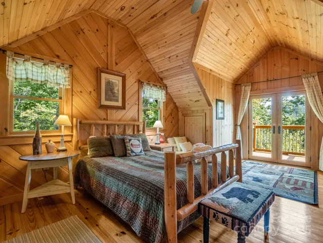 a view of a patio with table and chairs