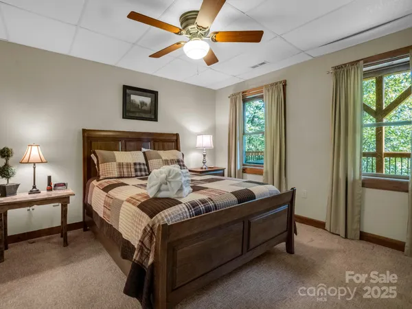 a bed room with a bed and a window