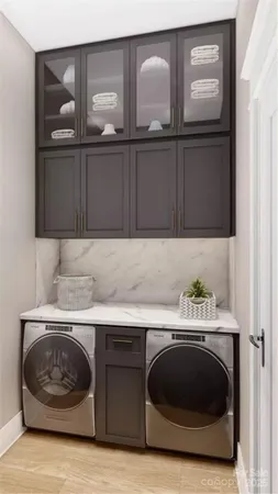 a kitchen with a cabinets and window