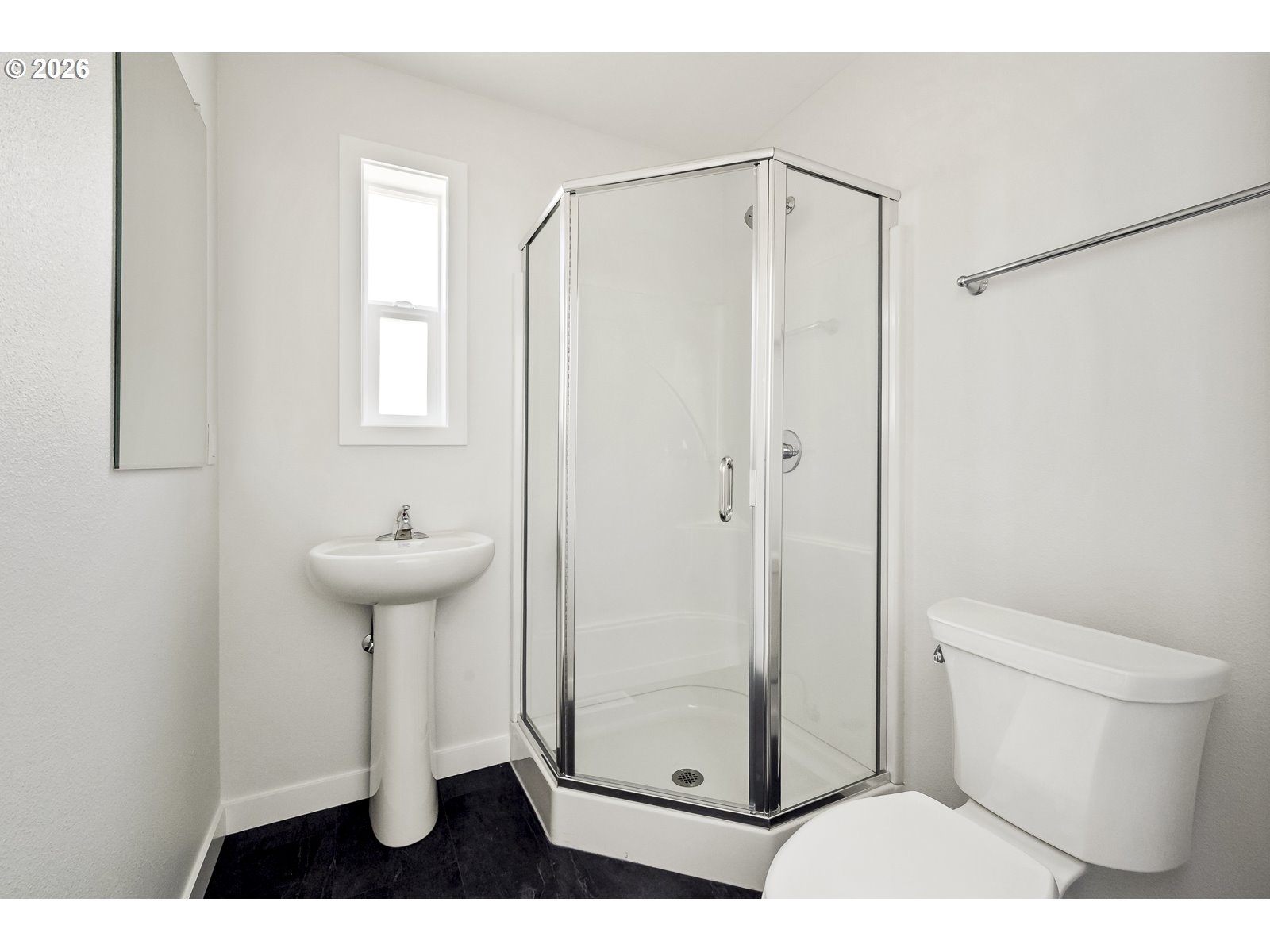 4750 Southwest Larch Drive Beaverton, OR 97005 - Photo 32 of 48 a bathroom with a sink toilet and shower