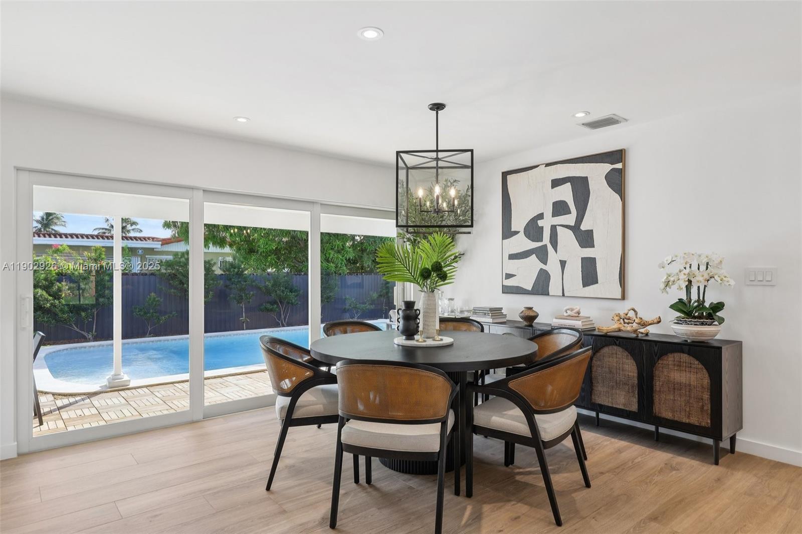2105 Southwest 98th Avenue Miami, FL 33165 - Photo 15 of 88 a view of a dining room with furniture window and outside view