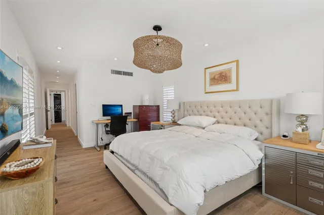 a view of a hallway with a hallway and a closet