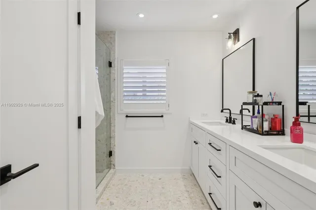 a living room with furniture a piano and a bookshelf