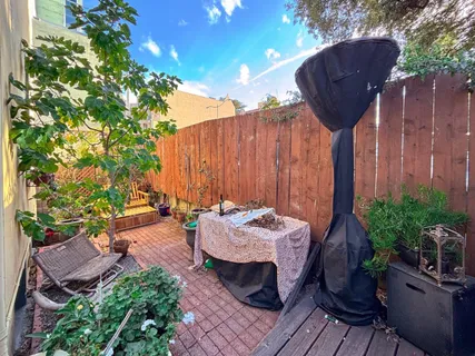 a view of kitchen with furniture and window