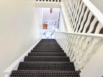 a bed room with a bed and a window