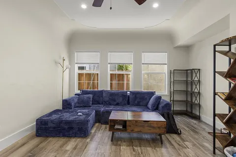 a kitchen with stainless steel appliances a refrigerator stove and microwave