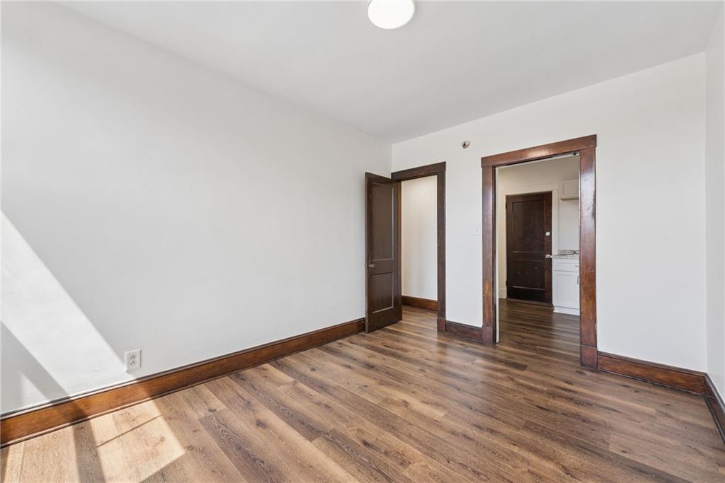 206 North Warren Avenue Apollo, PA 15613 - Photo 16 of 23 a view of an empty room with wooden floor