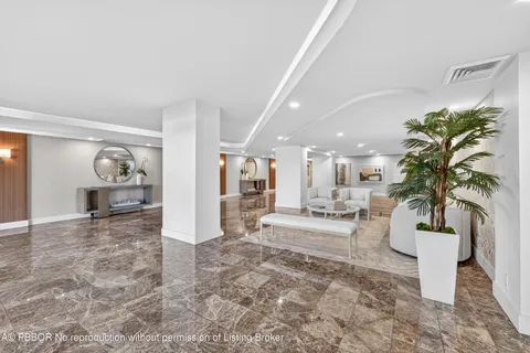 a view of a living room and kitchen