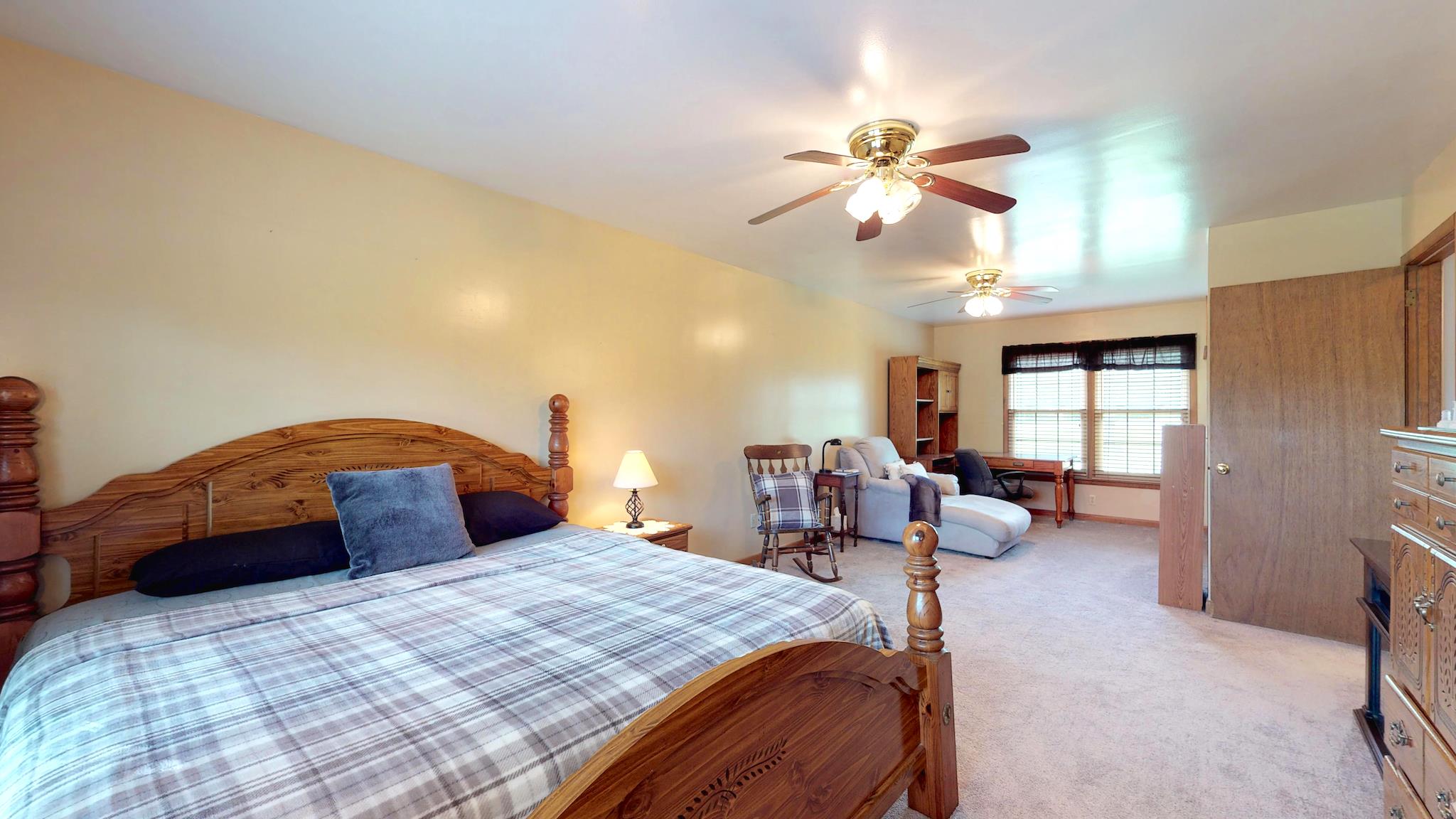 7209 Crow Cut Road Fairview, TN 37062 - Photo 14 of 30 a bedroom with a bed couch and window