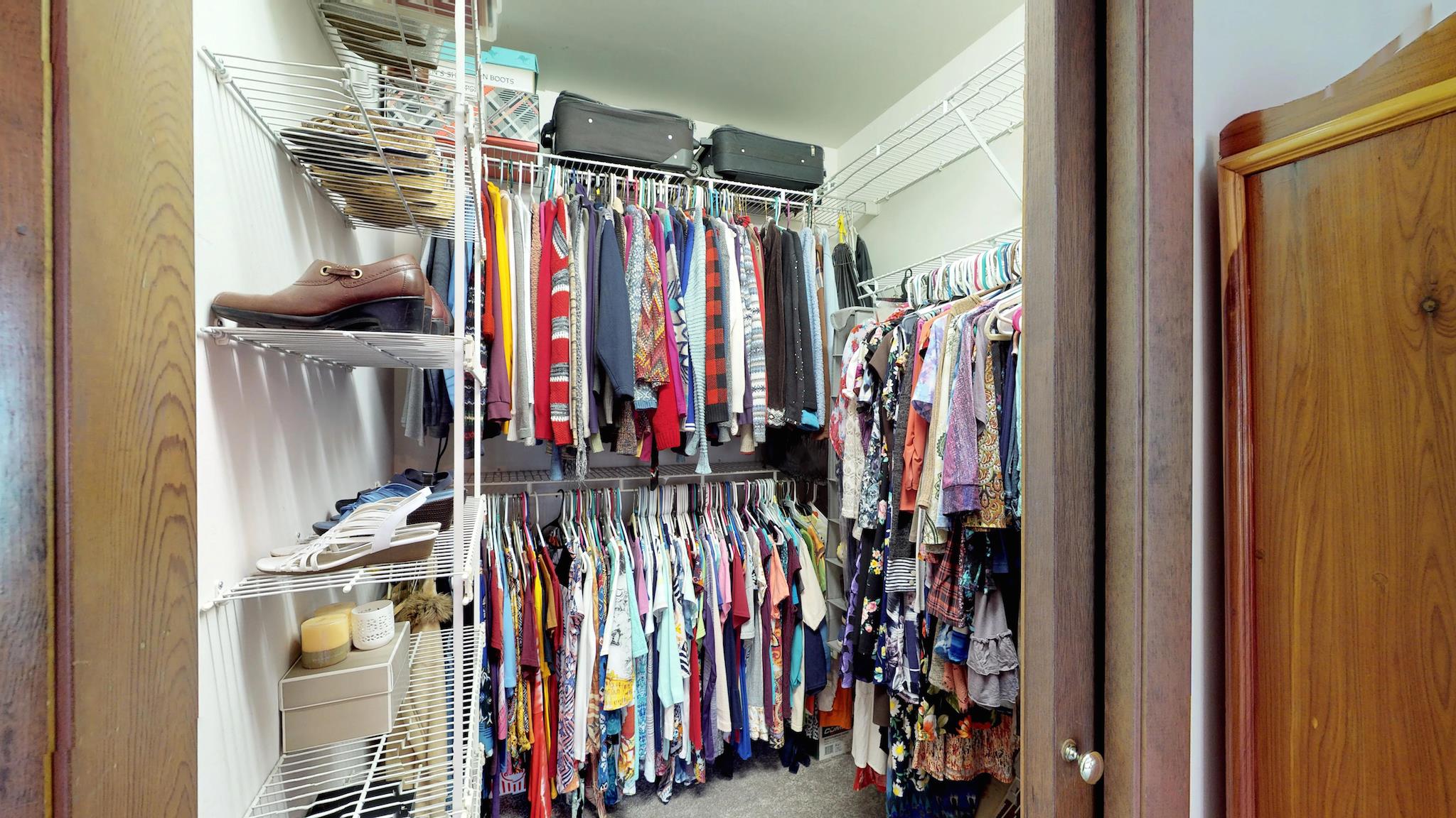 7209 Crow Cut Road Fairview, TN 37062 - Photo 18 of 30 a view of walk in closet with clothes