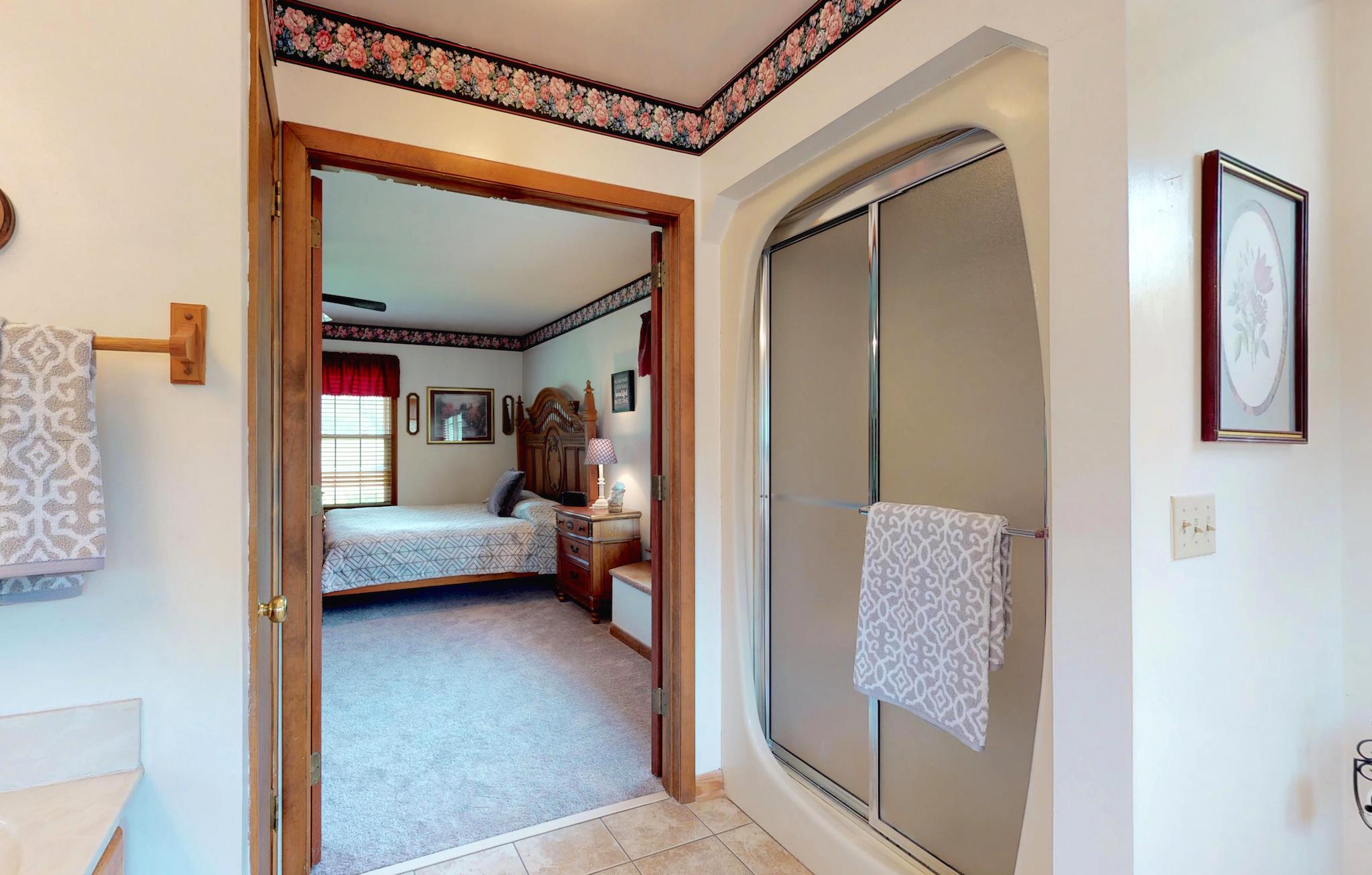 7209 Crow Cut Road Fairview, TN 37062 - Photo 21 of 30 a view of a bedroom from a hallway