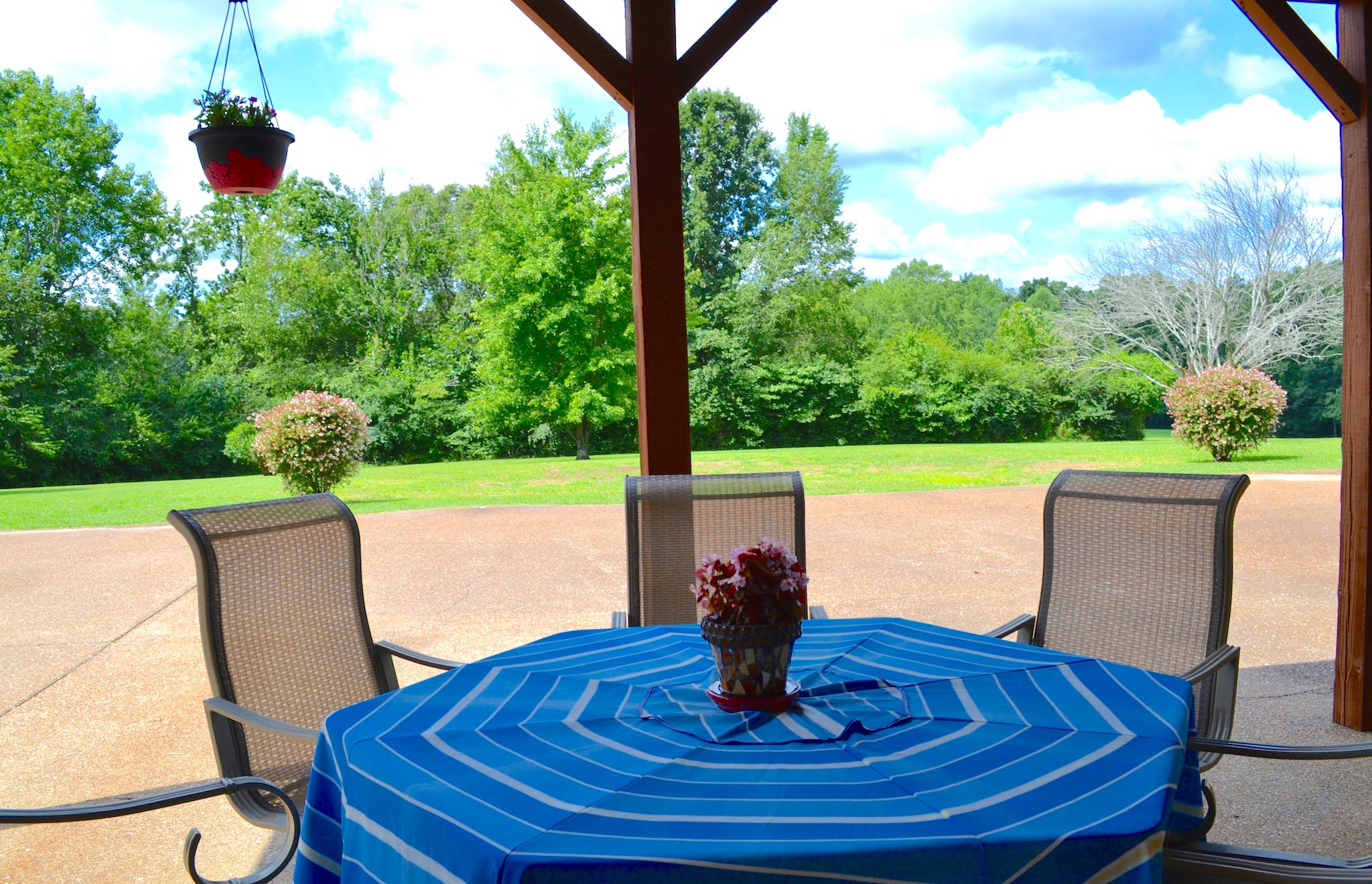 7209 Crow Cut Road Fairview, TN 37062 - Photo 25 of 30 a view of table and chairs in the patio