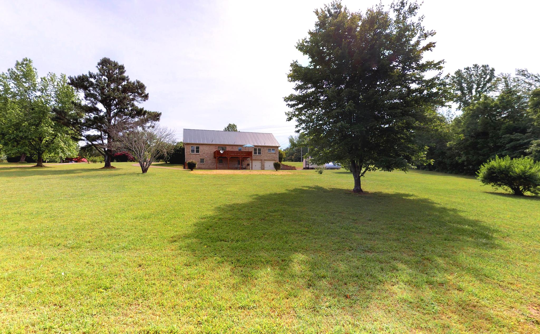 7209 Crow Cut Road Fairview, TN 37062 - Photo 27 of 30 a view of a trees with yard in front of the house