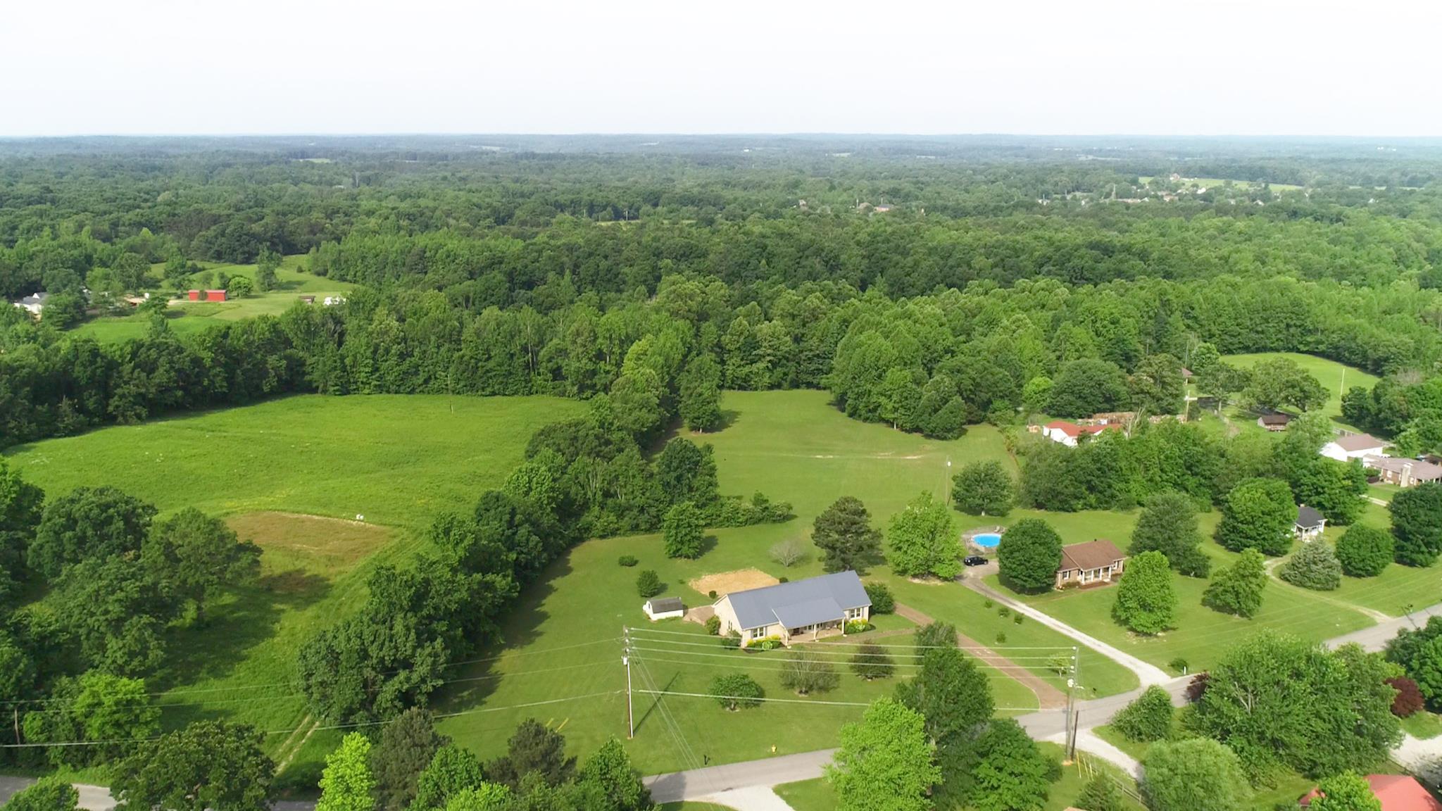 7209 Crow Cut Road Fairview, TN 37062 - Photo 4 of 30 an aerial view of residential houses with outdoor space and trees