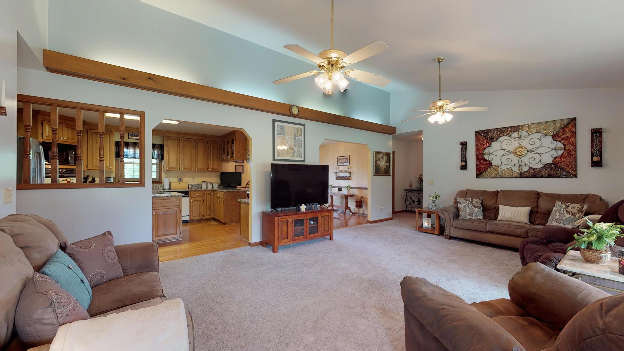 7209 Crow Cut Road Fairview, TN 37062 - Photo 6 of 30 a living room with furniture and a flat screen tv