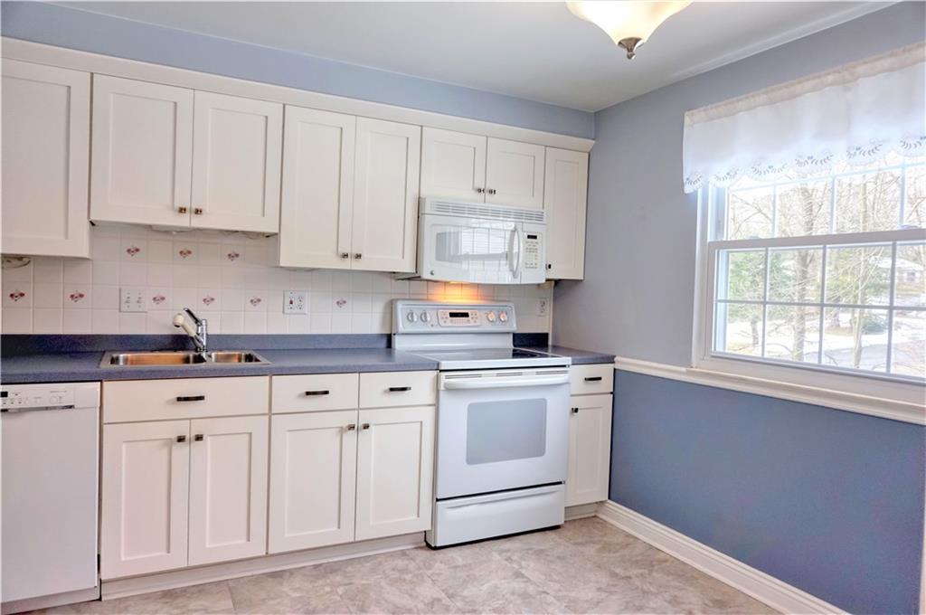 101 Walney Road Butler, PA 16002 - Photo 11 of 25 An abundance of cabinets, corian counters with lots of natural light!