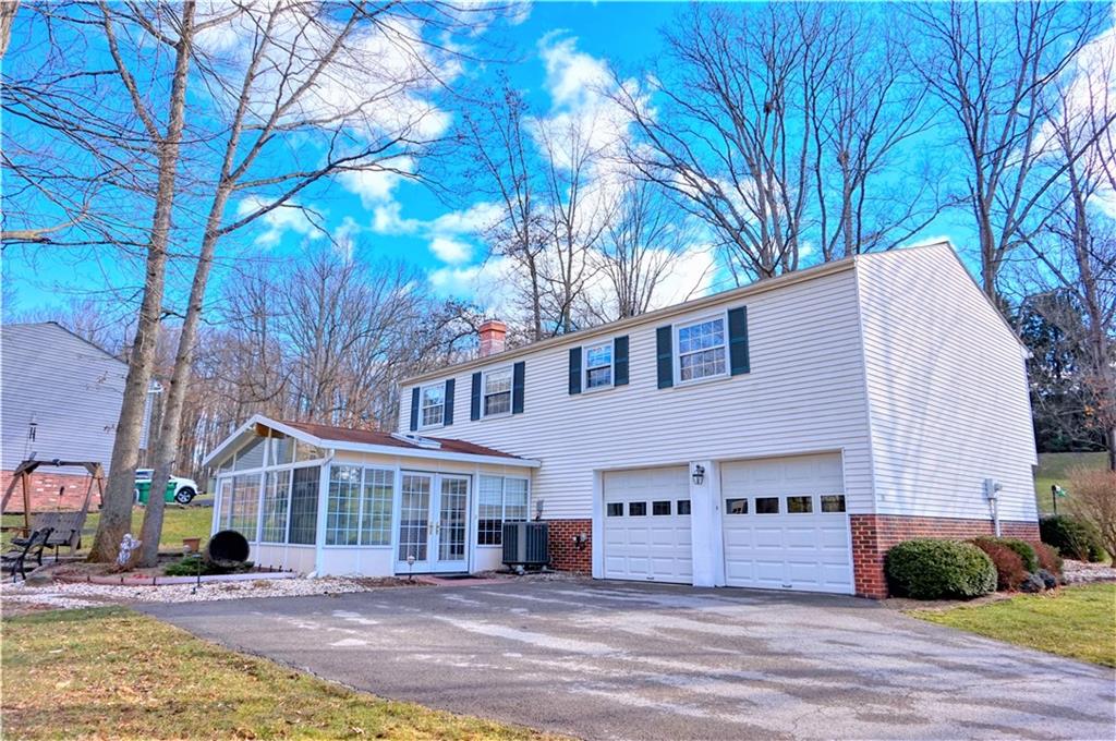101 Walney Road Butler, PA 16002 - Photo 4 of 25 A four seasons room and 2 stall garage!