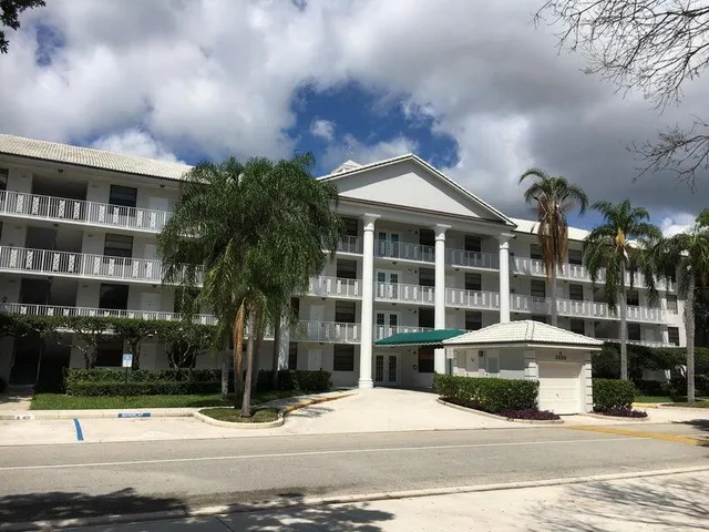 a front view of a building with street view
