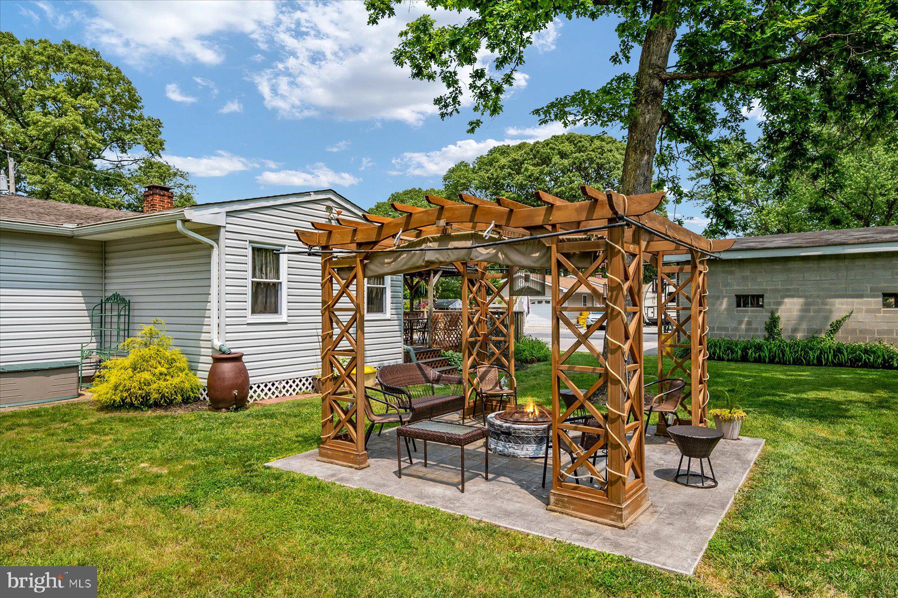 548 Sunset Knoll Road Pasadena, MD 21122 - Photo 27 of 39 Pergola and Fire Pit