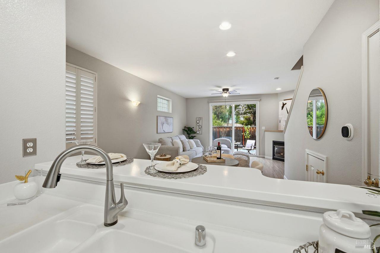 384 Mark West Commons Circle Santa Rosa, CA 95403 - Photo 15 of 44 a kitchen with a sink and a couch
