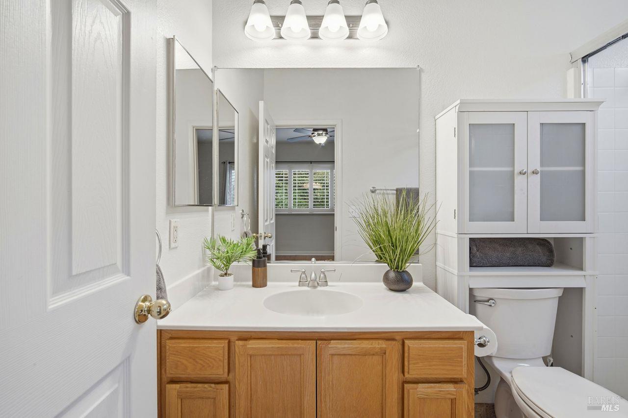 384 Mark West Commons Circle Santa Rosa, CA 95403 - Photo 28 of 44 a bathroom with a sink and a mirror