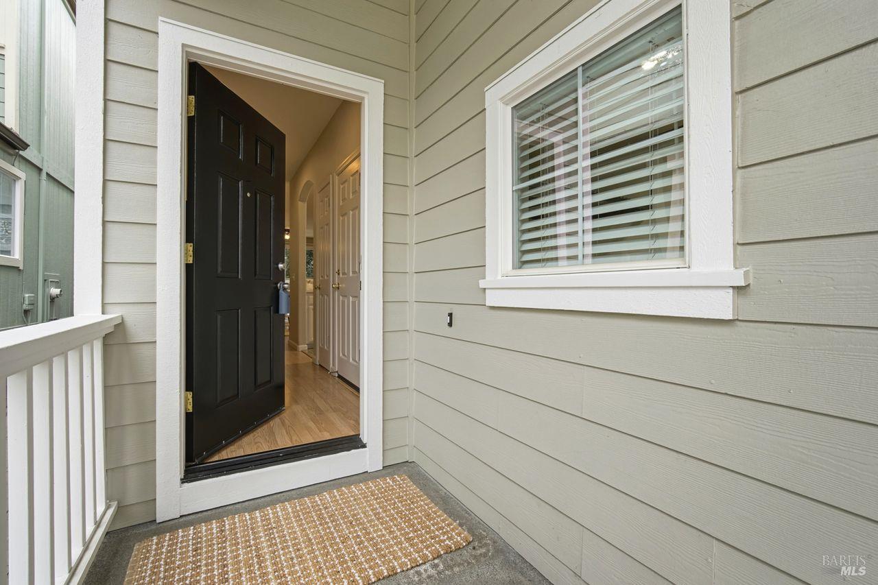 384 Mark West Commons Circle Santa Rosa, CA 95403 - Photo 3 of 44 a view of a door and a window