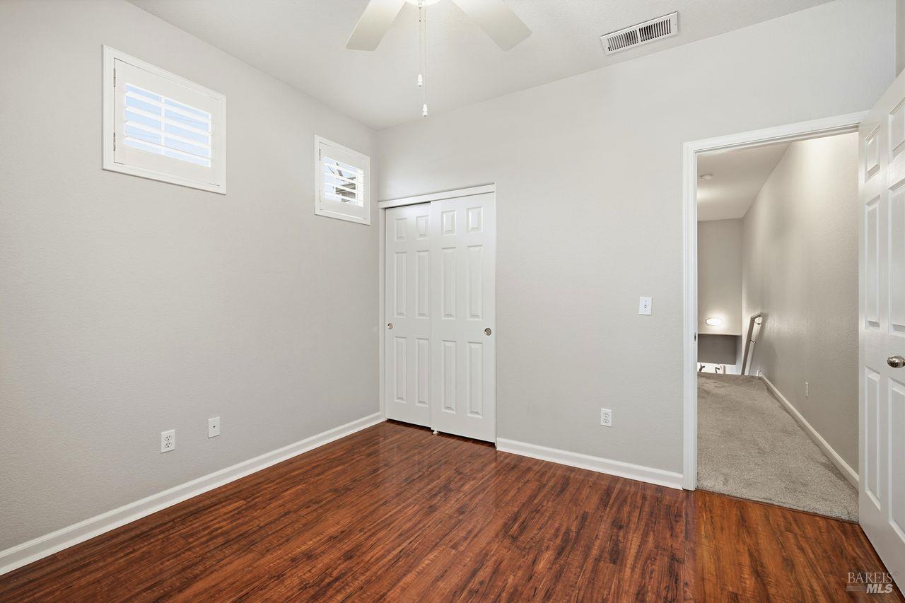 384 Mark West Commons Circle Santa Rosa, CA 95403 - Photo 31 of 44 wooden floor in an empty room with a window
