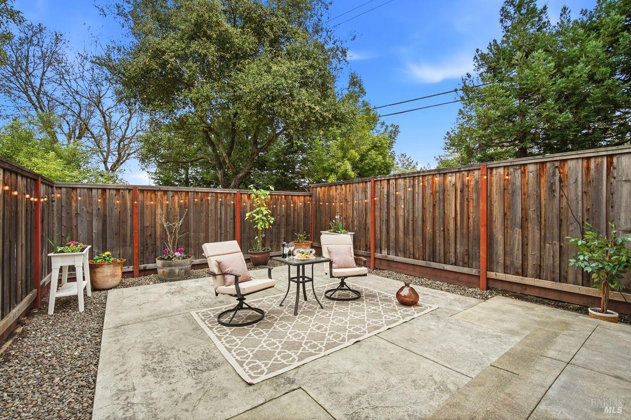 384 Mark West Commons Circle Santa Rosa, CA 95403 - Photo 41 of 44 a backyard of a house with table and chairs