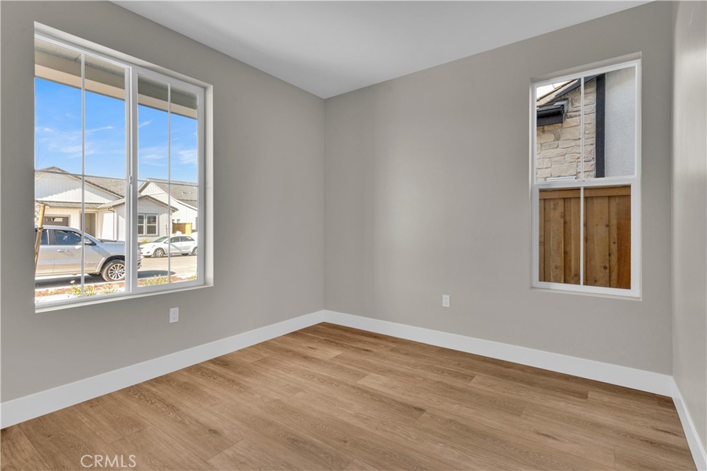3730 Rosado Road Paso Robles, CA 93446 - Photo 11 of 17 a view of an empty room with wooden floor and a window