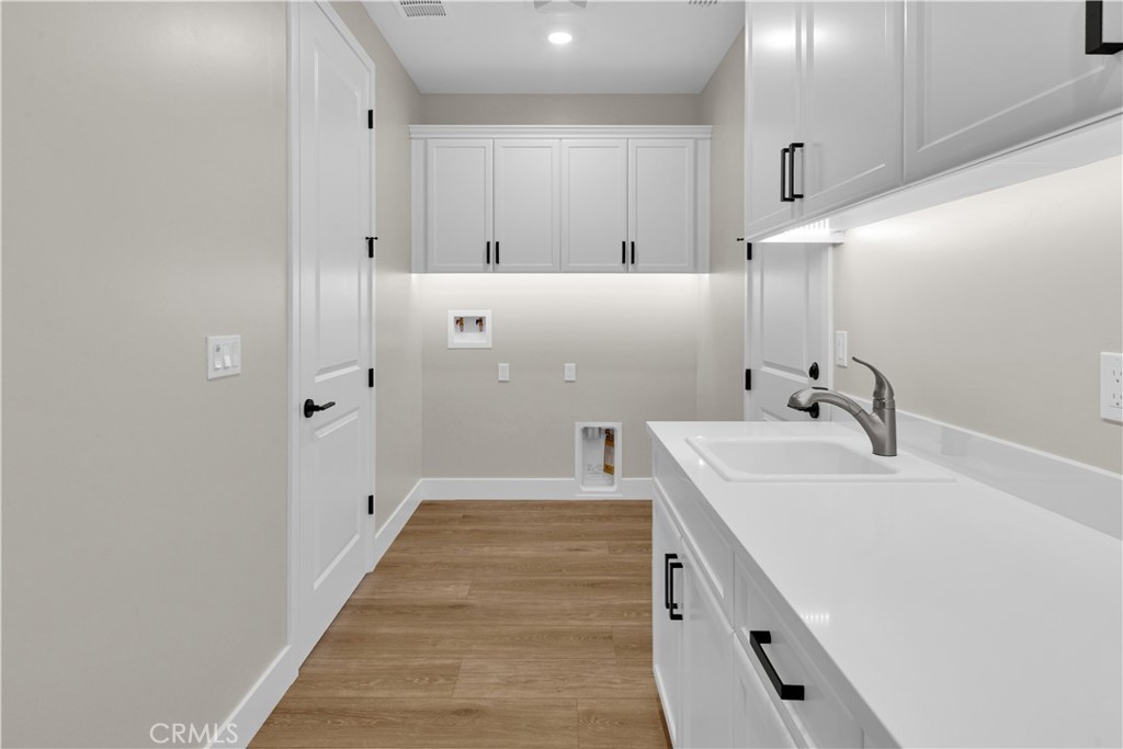 3730 Rosado Road Paso Robles, CA 93446 - Photo 15 of 17 a spacious bathroom with a sink and a mirror
