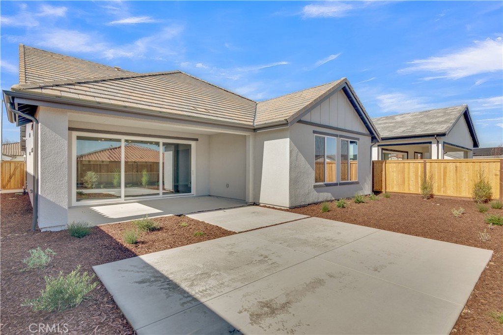 3730 Rosado Road Paso Robles, CA 93446 - Photo 7 of 17 a front view of a house with a yard and garage