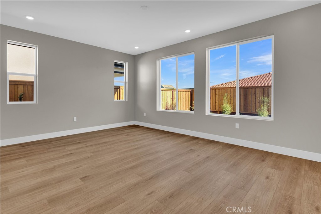 3730 Rosado Road Paso Robles, CA 93446 - Photo 8 of 17 a view of an empty room with wooden floor and a window