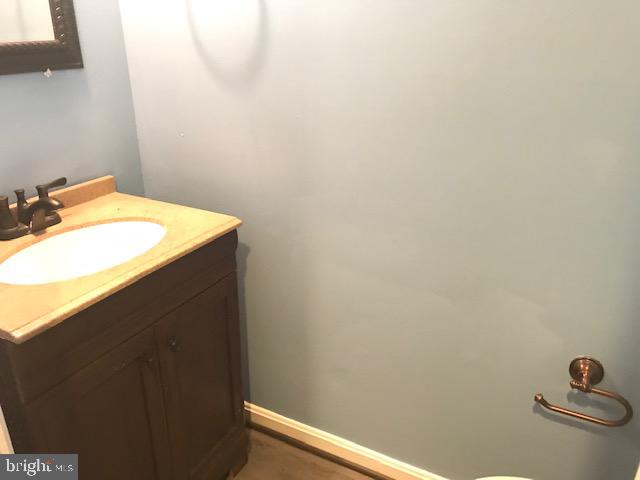 4911 7th Road South, Unit 4911 Arlington, VA 22204 - Photo 6 of 21 a bathroom with a sink and vanity