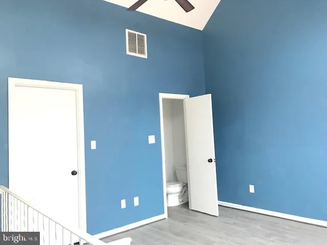 a view of a room with a hallway