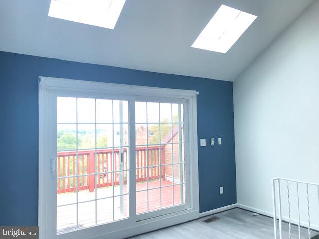 4911 7th Road South, Unit 4911 Arlington, VA 22204 - Photo 10 of 21 a view of an empty room with a window
