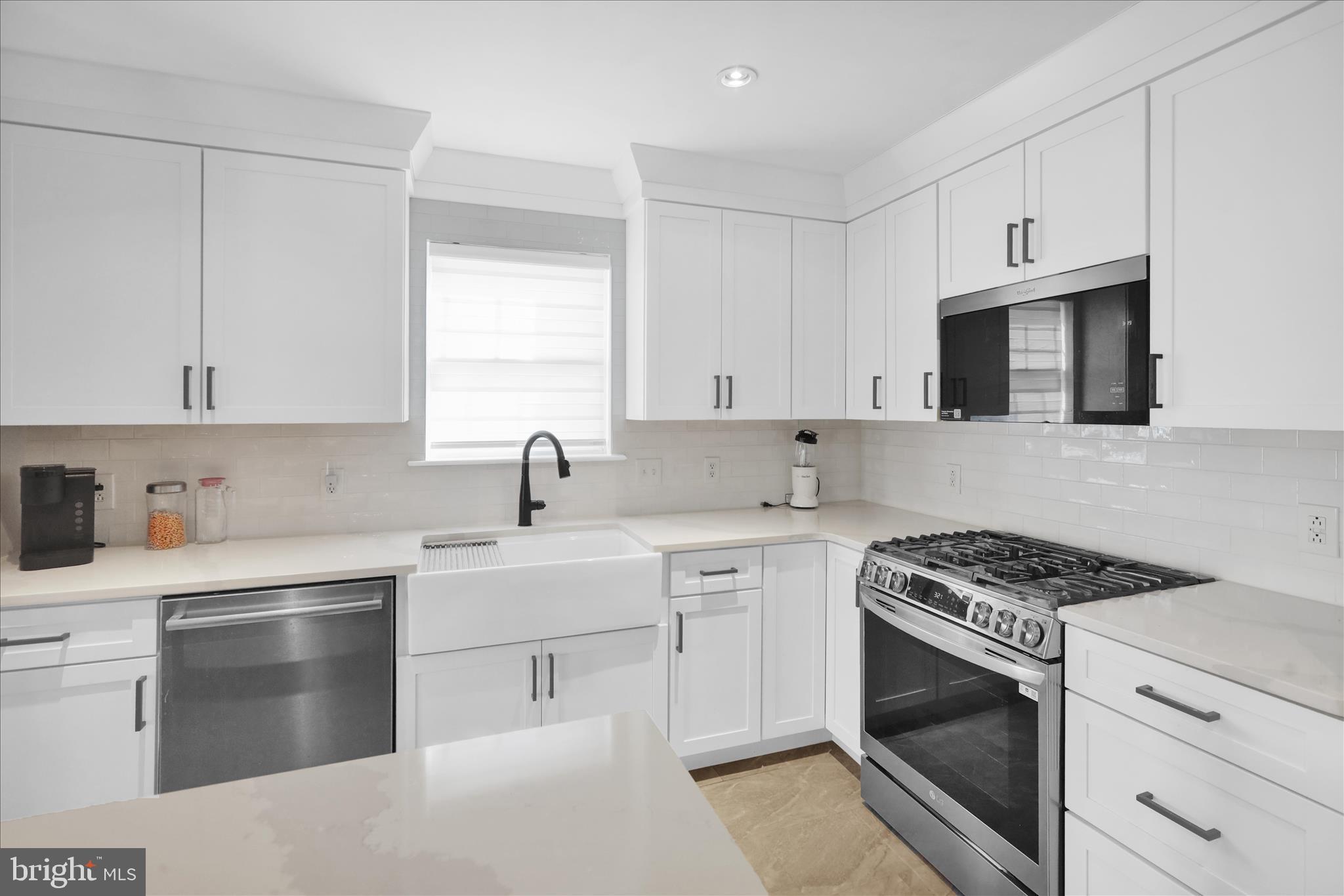 18 Bowes Lane Reading, PA 19606 - Photo 9 of 34 a kitchen with cabinets stainless steel appliances and sink