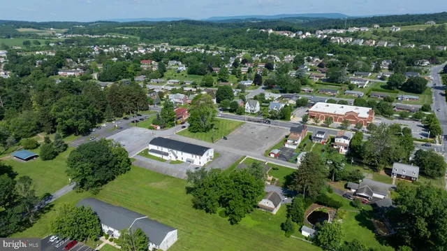 an aerial view of a city with lots of residential buildings