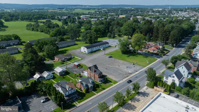 an aerial view of a city with lots of residential buildings