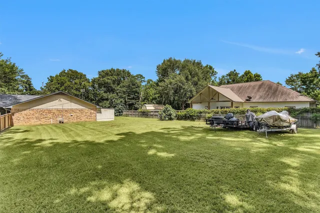 a view of a house with a big yard