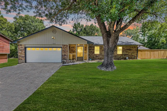 a view of outdoor space yard and garage
