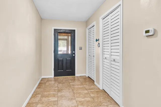 an entryway with a bedroom