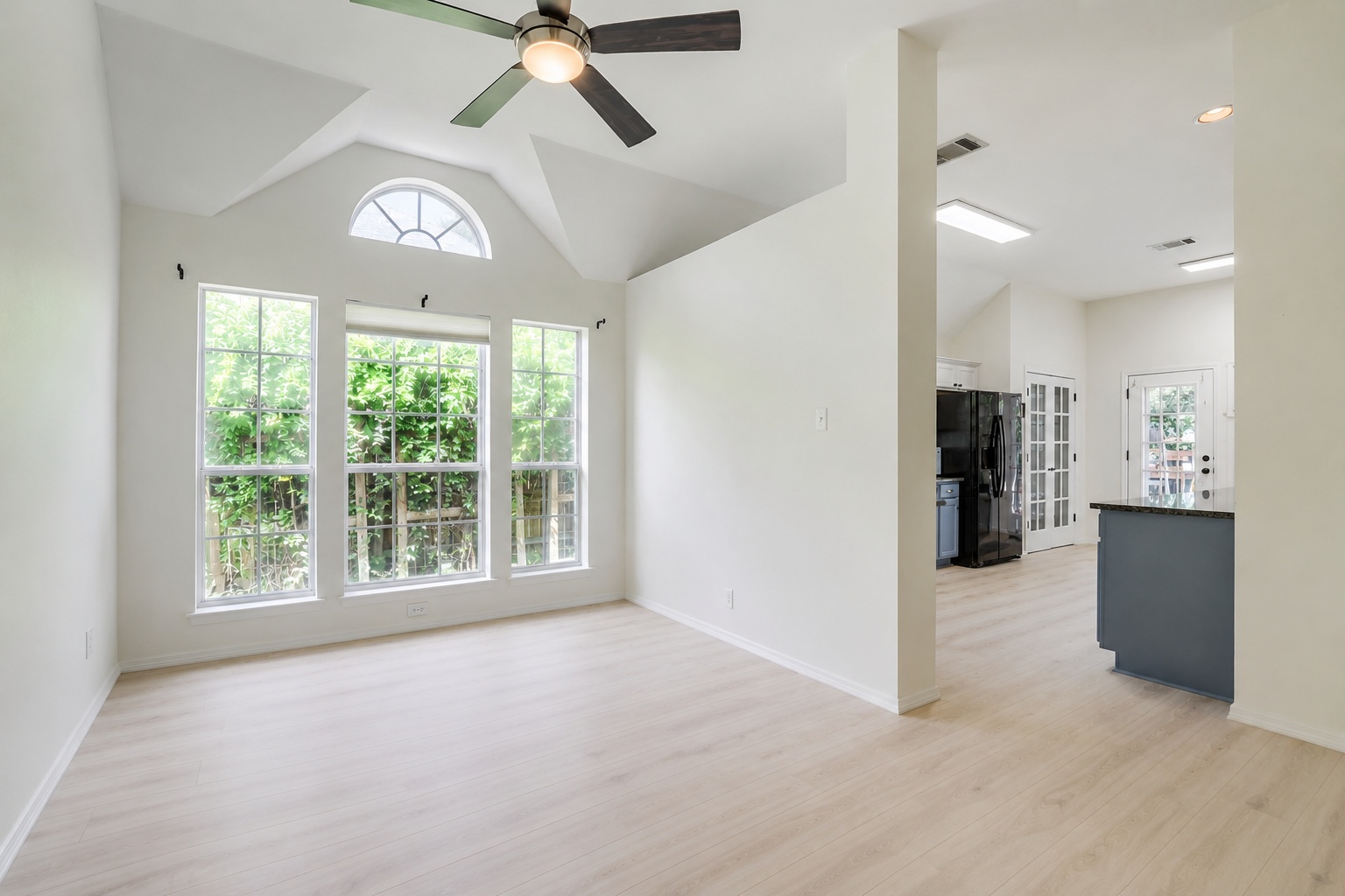 206 Gann Street Georgetown, TX 78626 - Photo 6 of 19 a view of a livingroom with a ceiling fan and window