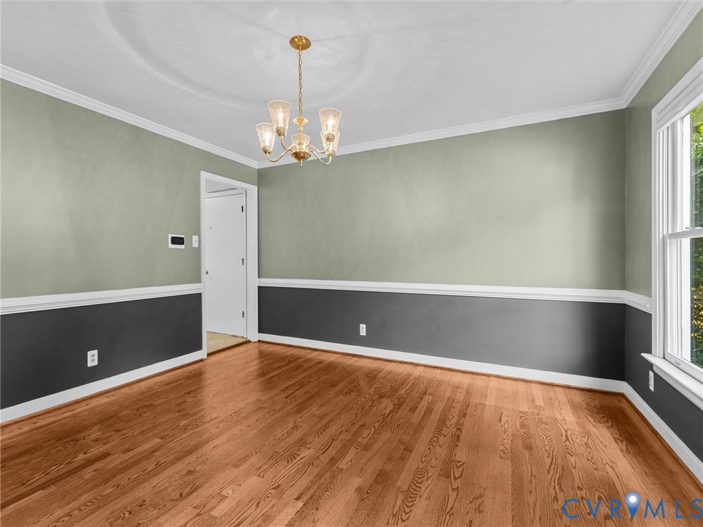 5702 Standing Oak Road Midlothian, VA 23112 - Photo 4 of 60 Dining Room featuring hardwood flooring, two-tone